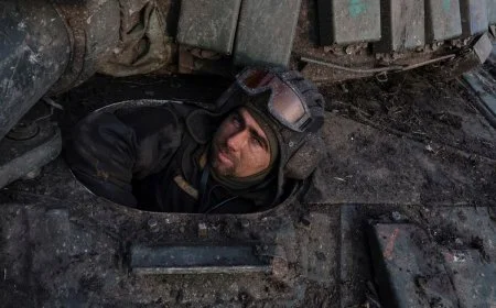 A Ukrainian serviceman looks on from a tank near the frontline town of Bakhmut, amid Russia's attack on Ukraine, in Donetsk region, Ukraine March 7, 2023. Radio Free Europe/Radio Liberty/Serhii Nuzhnenko via REUTERS