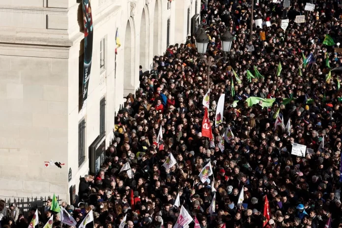 A general view shows protesters, members of French Socialist party and members of the EELV ecologist party gathering at Place d'Italie during a demonstration against French government's pension reform plan in Paris as part of a day of national strike and protests in France, January 31, 2023. REUTERS/Benoit Tessier