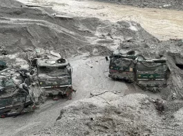 Trucks buried in mud are seen in an area affected by flood in Sikkim in this undated handout image released by the Indian Army on October 5, 2023. India Army/Handout via REUTERS