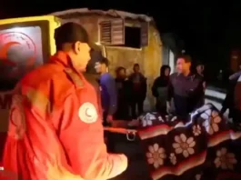 A wounded Palestinian is carried into an ambulance following Israeli strikes, amid the ongoing conflict between Israel and the Palestinian Islamist group Hamas, at a location given as Deir al-Balah, Gaza in this screenshot taken from a handout video released on December 22, 2023. Palestine Red Crescent Society/Handout via REUTERS/File Photo