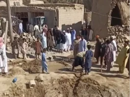 People gather near rubble in the aftermath of Pakistan's military strike on an Iranian village near Saravan, Sistan and Baluchestan Province, Iran, January 18, 2024. via REUTERS