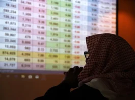 A Saudi trader monitors stocks at the Saudi stock market in Riyadh, Saudi Arabia, January 8, 2020. REUTERS/Ahmed Yosri/File Photo